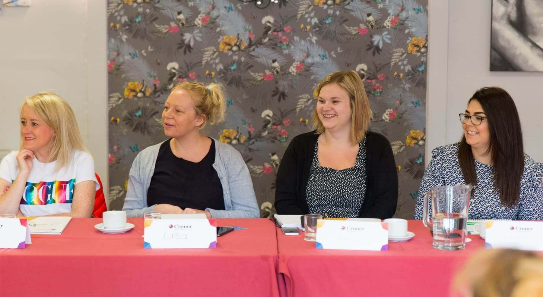 image of people sat at a table