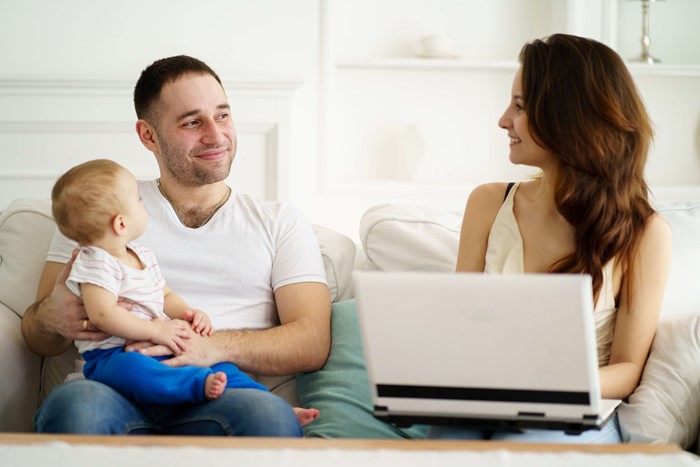 couple at home with child