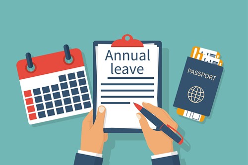 absence leave someone marking off time for annual leave