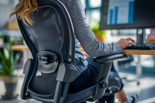 A chair with a lumbar support for employees with a bad back make reasonable adjustments