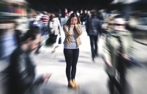 Photo of a woman showing evidence of poor mental health.