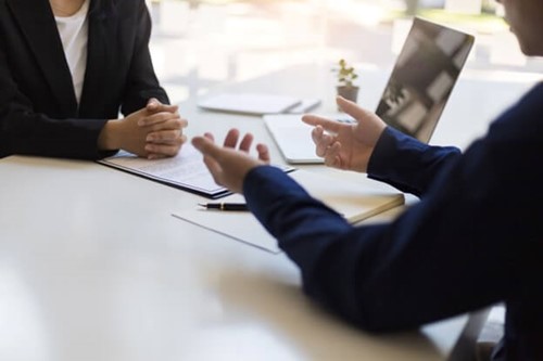 Employee in a redundancy consultation discussing voluntary redundancy as well as other options.