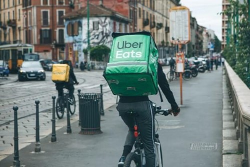 Uber Rider delivering food as a gig economy worker.