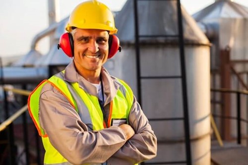 an employee wearing PPE on a building site