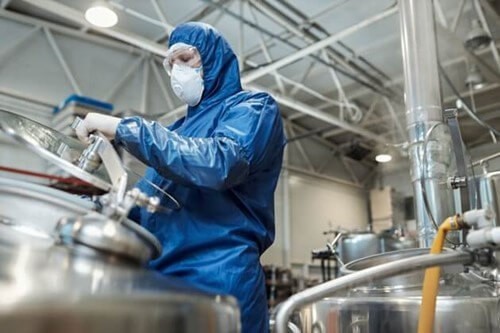 a worker with a mask, to control the workplace exposure limit