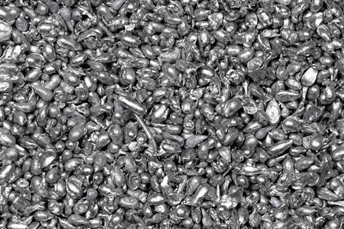 Lead granules in their raw form.