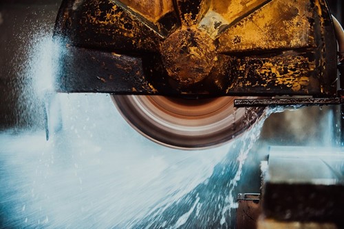 A cutting disc with a water suppression system in place in compliance with the new COSHH guidance.