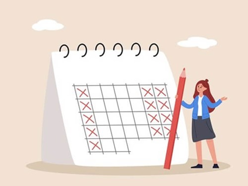 An employer looking at their employees shift patterns