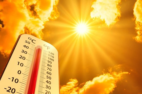 A picture of a thermometer indicating extreme hot weather.
